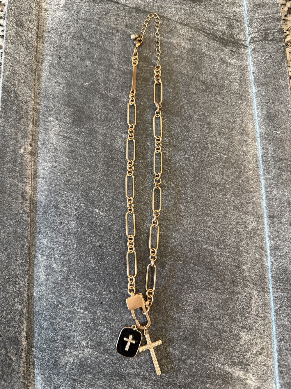 Gold Tone Cross Pendant Necklace with Black Accent Charm